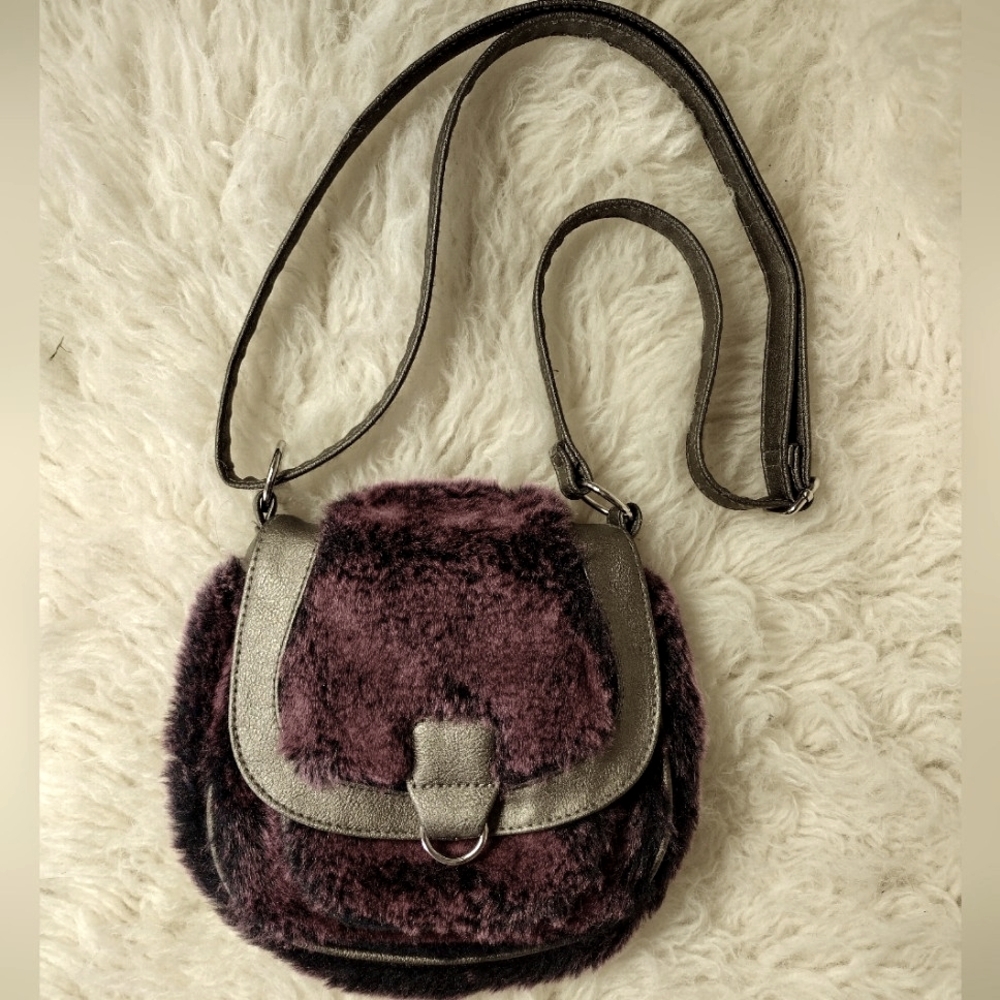 Fuzzy purse cute by Claire's